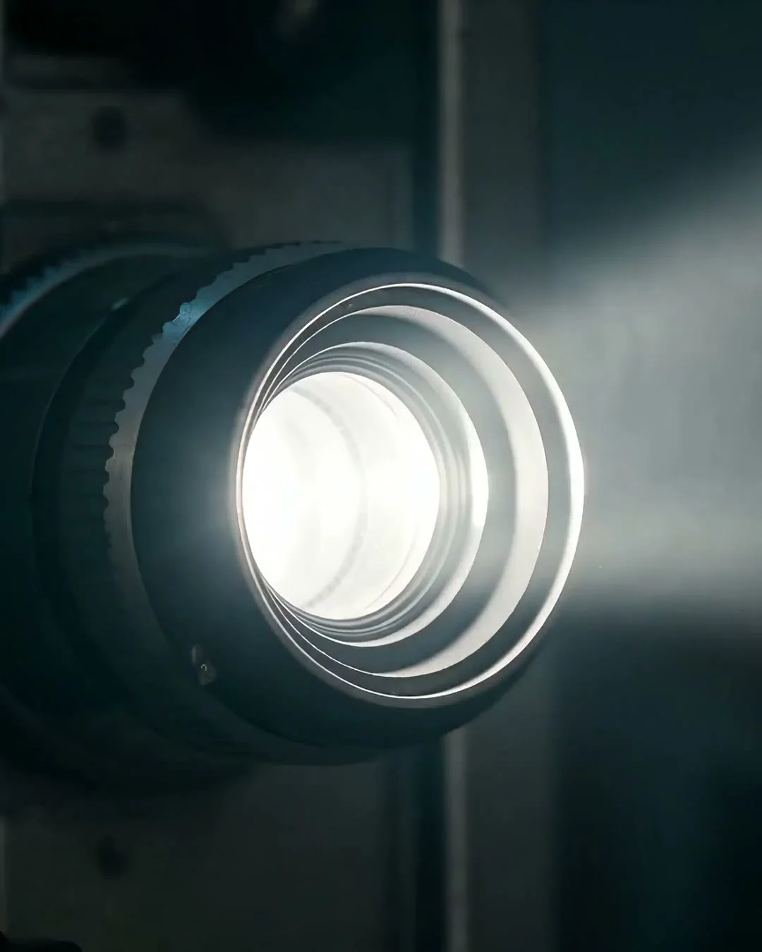 A projector casting evidence into a dark room