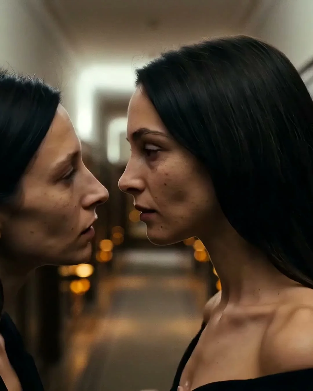 Two women facing one another inside the Marbella villa
